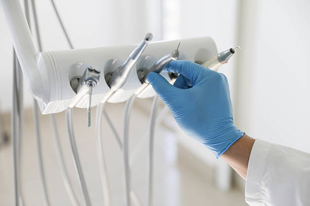 Professional Tooth Extraction technician working in Barclay, NJ